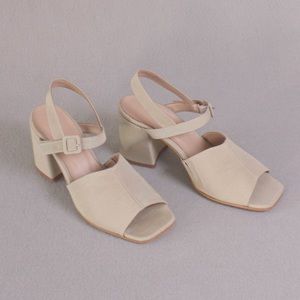 About Arianne Rita Sandal in Stone